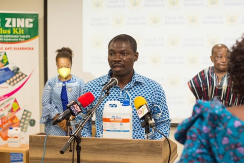 MR. ERNEST OPOKU, CHIEF FINANCE OFFICER OF PHYTO-RIKER (GIHOC) PHARMACEUTICAL (PRG), OUTLINING THE DETAILS OF PRG’S DONATION TO THE MINISTRY OF HEALTH.